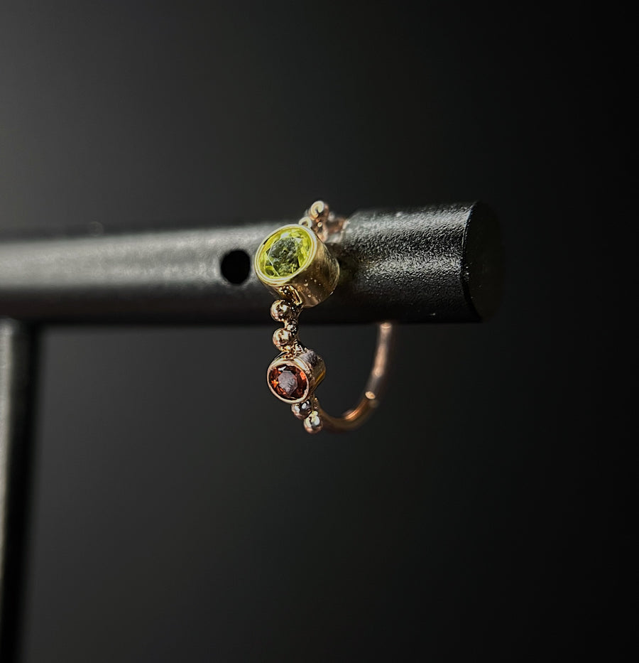 Dusk Seamless Garnet and Peridot Ring