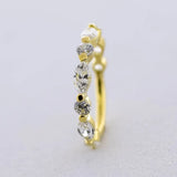 18k Hinge Ring: Round and Marquise Stones