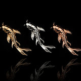 yellow, white, and rose gold detailed koi fish piercing jewelry for threadless posts